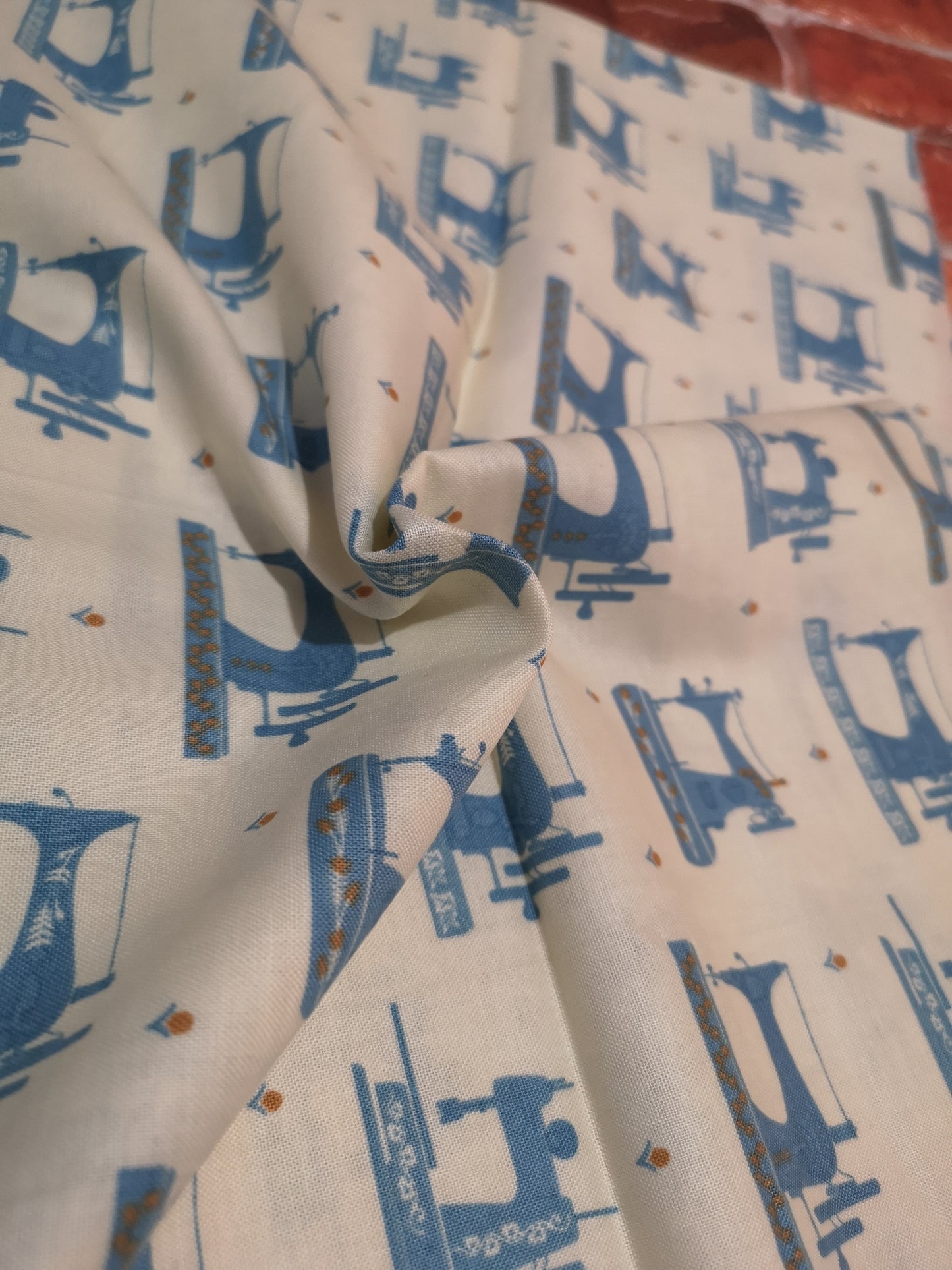 100% Cotton fabric: red London bus, flowers, roses, Japanese dolls, grey turquoise stars, Debbie Shore sewing machine, cherry blossom