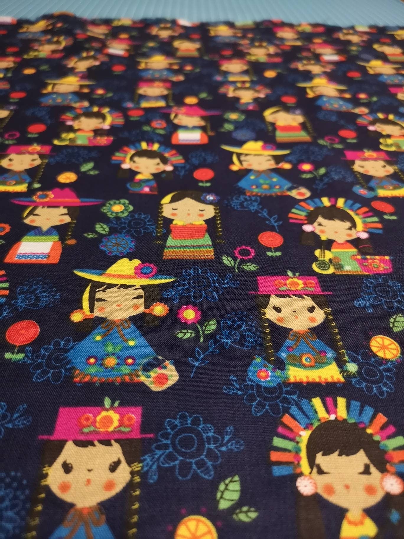 100% Cotton fabric: red London bus, flowers, roses, Japanese dolls, grey turquoise stars, Debbie Shore sewing machine, cherry blossom