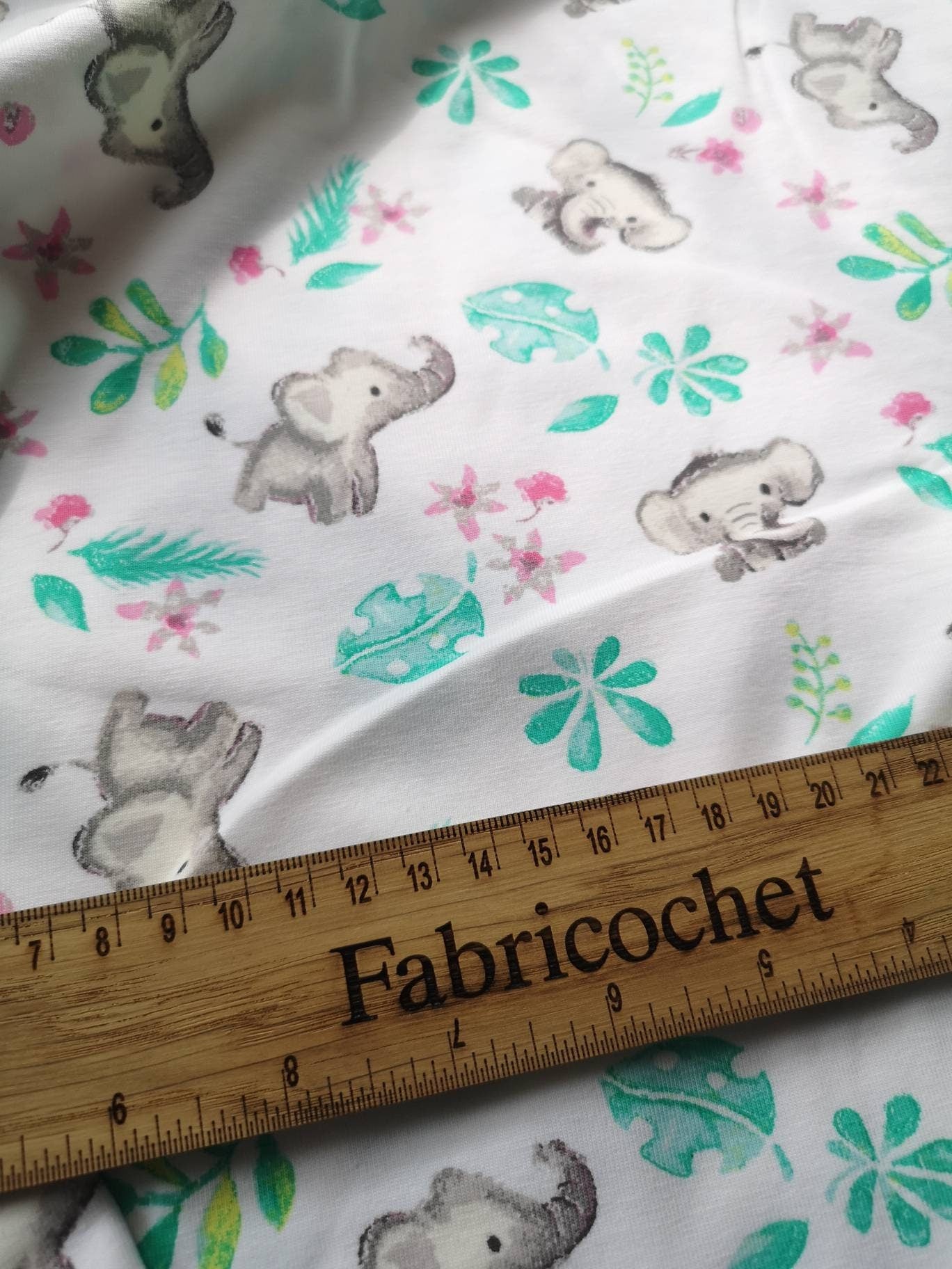 John Louden digitally printed animal jersey fabric: elephants and koalas