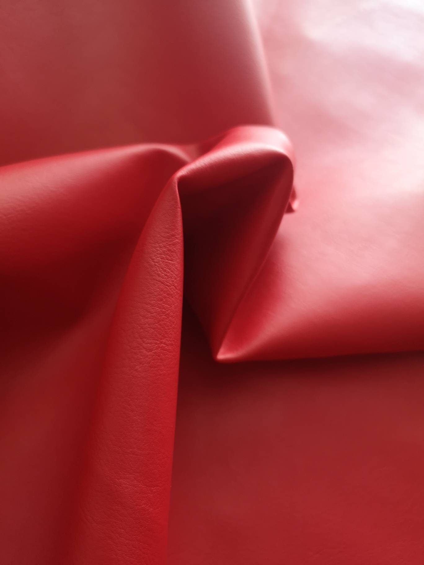 PVC leather: black and red. Soft leatherette, leathercloth