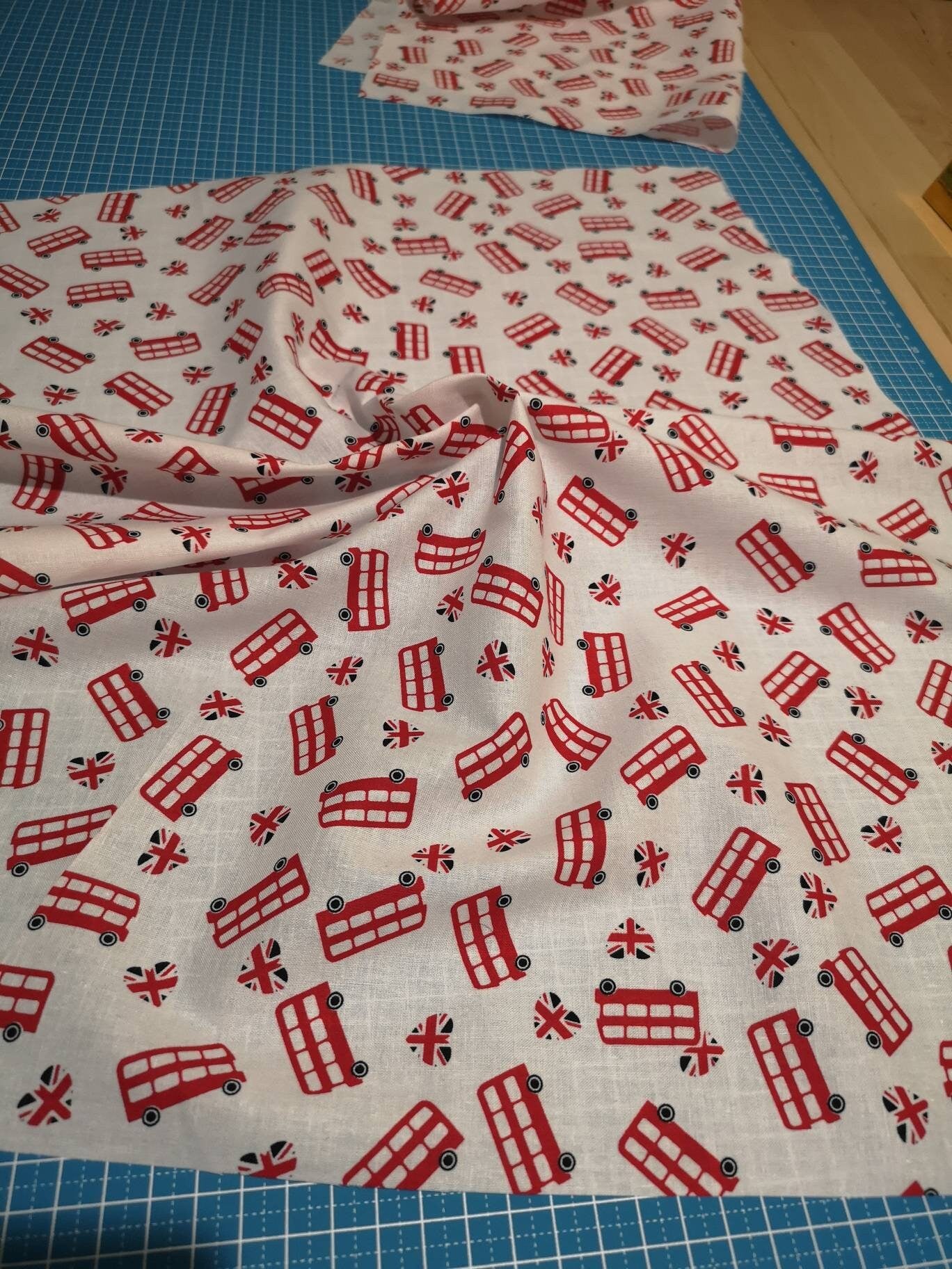 100% Cotton fabric: London bus, roses, Japanese dolls, grey turquoise stars, sewing machine, cherry blossom, sailing boats, dog toys